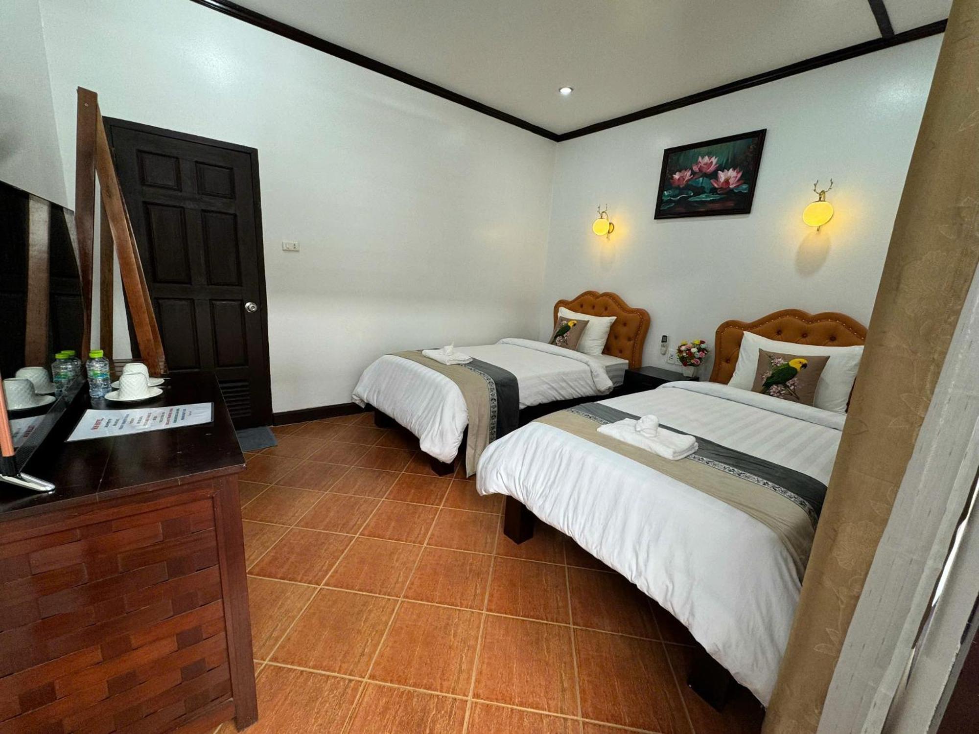 Win Hotel Vang Vieng Værelse billede